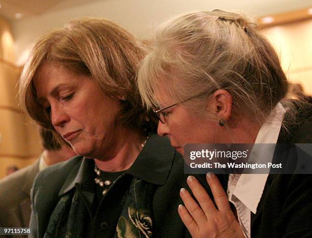 Ronald Reagan Building, Washington, DC Mary Fetchet, left, is consoled by Kathy Wisniewski during the 9/11 Public Discourse Project's final...