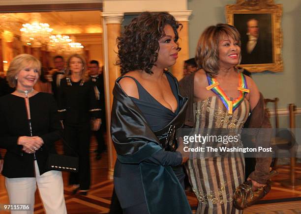 The State Department C Street, NW Oprah Winfrey, center, and 2005 Kennedy Center honoree Tina Turner after dinner at the State Department in...