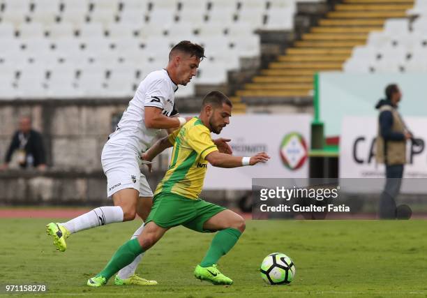 Mafra midfielder Mauro Antunes from Portugal with SC Farense midfielder Andre Vieira from Portugal in action during the Campeonato de Portugal Final...