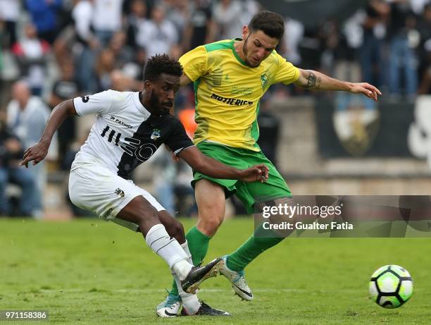 Farense midfielder Fabricio Isidoro from Brazil with CD Mafra midfielder Lucas Morelatto from Brazil in action during the Campeonato de Portugal...