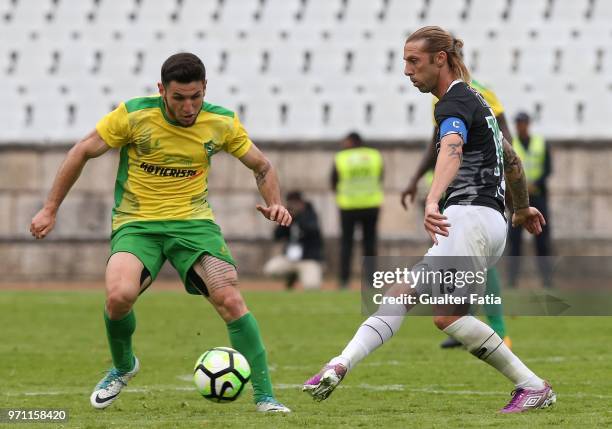 Farense midfielder Neca from Portugal with CD Mafra midfielder Lucas Morelatto from Brazil in action during the Campeonato de Portugal Final match...