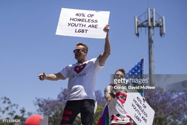 Parade participants advocate for LGBT homeless youth during the 48th annual LA Pride Parade on June 10 in the Hollywood section of Los Angeles and...