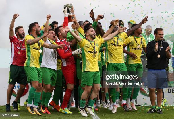 Mafra players and staff members celebrate with trophy after winning the Campeonato de Portugal Final at the end of the Campeonato de Portugal Final...