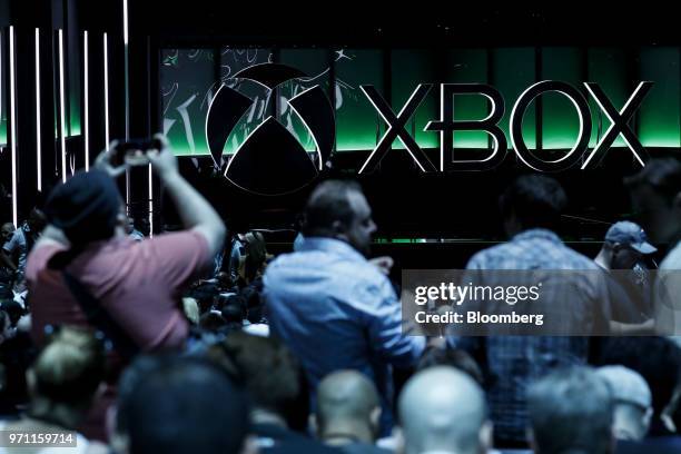 Attendees gather during the Microsoft Corp. Xbox event ahead of the E3 Electronic Entertainment Expo in Los Angeles, California, U.S., in Los...