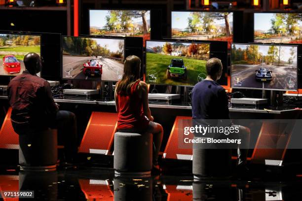 Attendees play the Forza Horizon 4 video game during the Microsoft Corp. Xbox event ahead of the E3 Electronic Entertainment Expo in Los Angeles,...