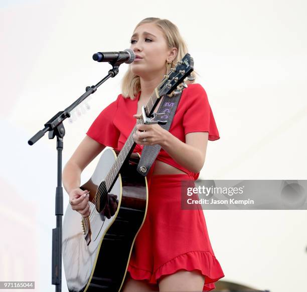 Maddie Marlow of musical duo Maddie and Tae performs onstage during the 2018 CMA Music festival at the Chevy Riverfront Stage on June 10, 2018 in...