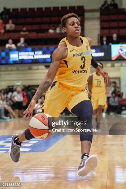 Indiana Fever guard Tiffany Mitchell drives to the basket during the first half of a WNBA game between the Indiana Fever and New York Liberty on June...