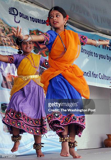 The 2003 Zee Heritage India festival is going on at the Moco fairgrounds today and tomorrow. Pictured, members of 10-year-old Sriya Babu, forground,...