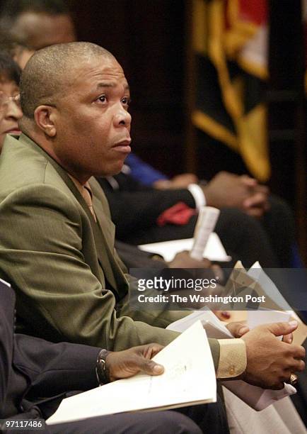 Pg-johnson 5-6-03 Mark Gail/TWP Prince George's County Drector of Community Relations Chris Osuji listens during confirmation hearings for his...