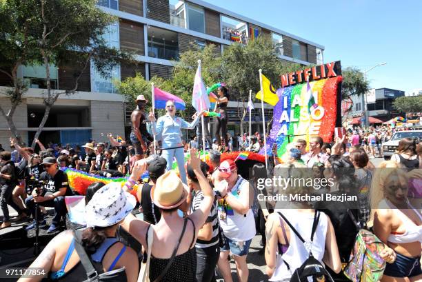 Toby Onwumere, Jamie Clayton, and Tina Desai are seen on the Netflix original series "Sense8" float at the Los Angeles Pride Parade on June 10, 2018...