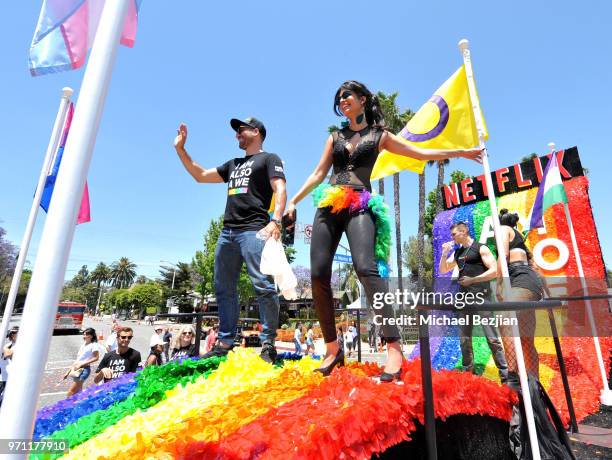 Miguel Angel Silvestre and Tina Desai are seen on the Netflix original series "Sense8" float at the Los Angeles Pride Parade on June 10, 2018 in West...