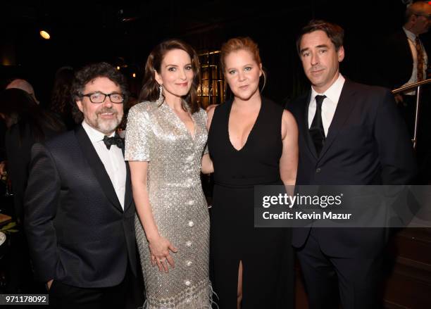 Jeff Richmond, Tina Fey, Amy Schumer and Chris Fischer pose backstage during the 72nd Annual Tony Awards at Radio City Music Hall on June 10, 2018 in...