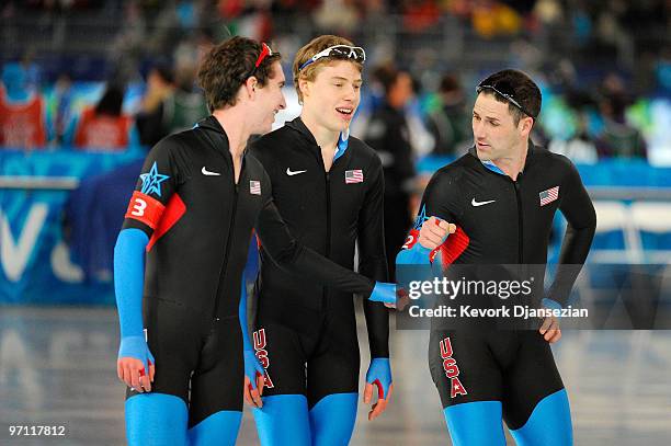 Chad Hedrick, Jonathan Kuck and Brian Hansen of team United States celebrate winning the Men's Team Pursuit Speed Skating Semi-Finals on day 15 of...