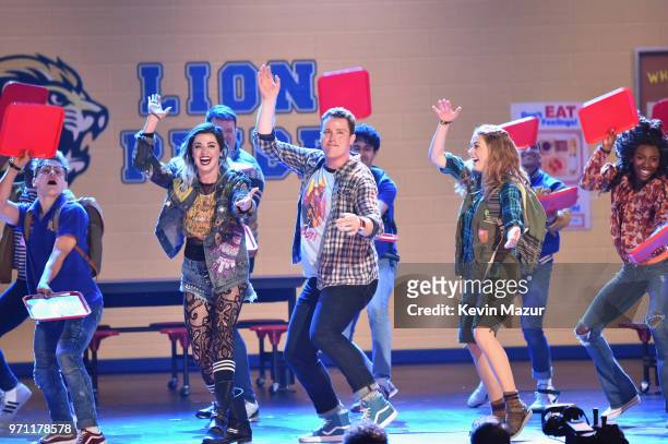 Barrett Wilbert Weed, Grey Henson, Erika Henningsen, and the cast of Mean Girls perform onstage during the 72nd Annual Tony Awards at Radio City...