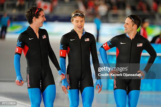 Chad Hedrick, Jonathan Kuck and Brian Hansen of team United States celebrate winning the Men's Team Pursuit Speed Skating Semi-Finals on day 15 of...