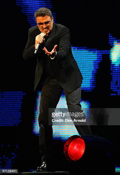 George Michael performs on stage on the Sydney Football Stadium on February 26, 2010 in Sydney, Australia.