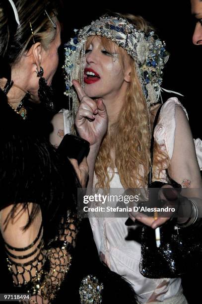 Daphne Guinness and Courtney Love attend the Vogue.it Milan Fashion Week Womenswear Autumn/Winter 2010 show on February 26, 2010 in Milan, Italy.