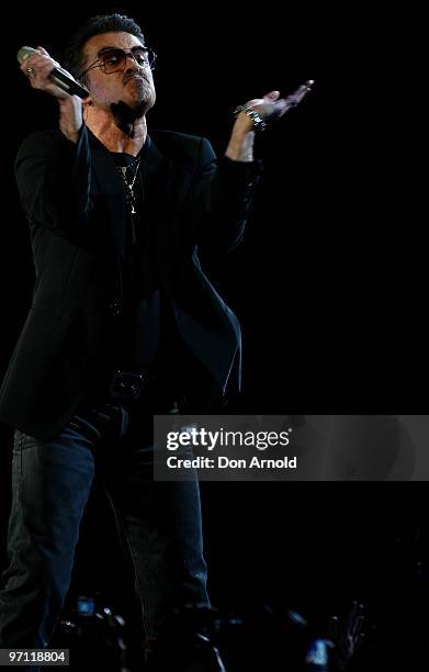 George Michael performs on stage on the Sydney Football Stadium on February 26, 2010 in Sydney, Australia.