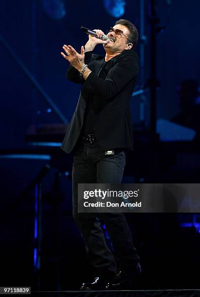 George Michael performs on stage on the Sydney Football Stadium on February 26, 2010 in Sydney, Australia.