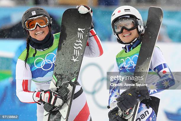 Claudia Riegler of Austria and Tomoka Takeuchi of Japan during the Snowboard Ladies' Parallel Giant Slalom on day 15 of the Vancouver 2010 Winter...