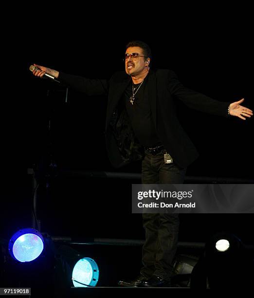 George Michael performs on stage on the Sydney Football Stadium on February 26, 2010 in Sydney, Australia.