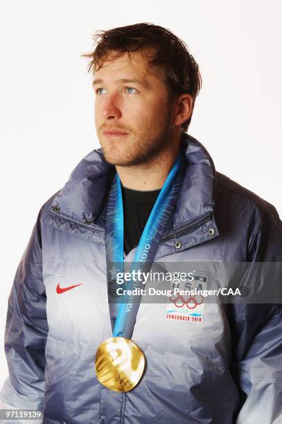 United States alpine skier Bode Miller poses for a photo with his gold medal won in the men's Super Combined during the 2010 Vancouver Winter Olympic...
