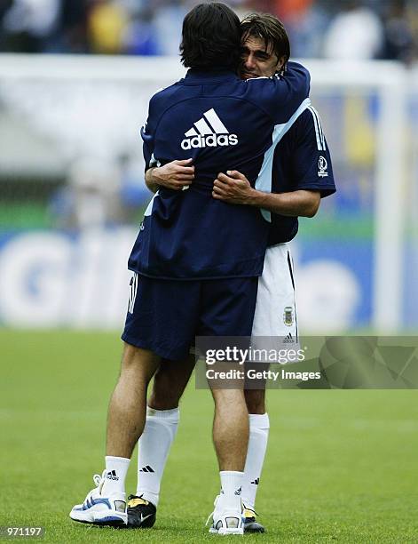 Claudio Lopez of Argentina is consoled after the Argentina v Sweden, Group F, World Cup Group Stage match played at the Miyagi Stadium, Miyagi, Japan...