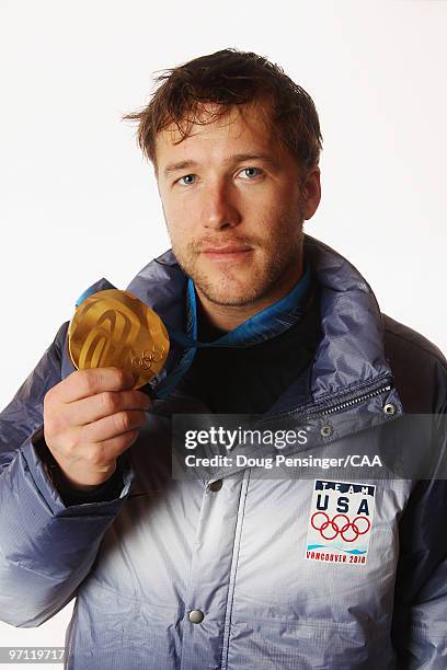 United States alpine skier Bode Miller poses for a photo with his gold medal won in the men's Super Combined during the 2010 Vancouver Winter Olympic...