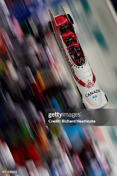 Lyndon Rush, Chris Le Bihan, David Bissett and Lascelles Brown of Canada compete in Canada 1 during the four-man bobsleigh heat 2 on day 15 of the...