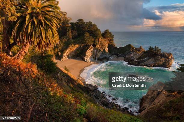 storm light at julia pfeiffer burns state park - julia smith stock pictures, royalty-free photos & images