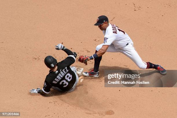 Ehire Adrianza of the Minnesota Twins tags out Omar Narvaez of the Chicago White Sox at second base during the game on June 7, 2018 at Target Field...
