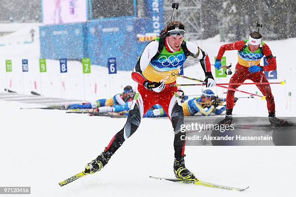 Dominik Landertinger of Austria competes during the men's 4 x 7.5 km biathlon relay on day 15 of the 2010 Vancouver Winter Olympics at Whistler...