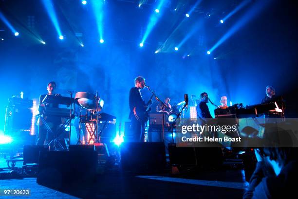 Owen Clarke, Al Doyle, Alexis Taylor and Joe Goddard of Hot Chip perform on stage at Brixton Academy on February 26, 2010 in London, England.