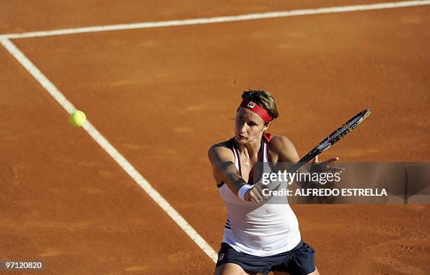 Slovenian tennis player Polona Hercog returns the ball to Spanish tennis player Carla Suarez, during the fifth day of the WTA Open in Acapulco,...