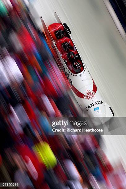 Lyndon Rush, Chris Le Bihan, David Bissett and Lascelles Brown of Canada compete in Canada 1 during the four-man bobsleigh heat 2 on day 15 of the...