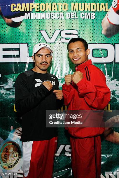Mexican fighter Omar Nino and Fillipinum Roder Mayol pose during a press conference for their fight at the Mision Carlton Hotel on February 25, 2010...