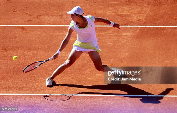 Spanish tennis player Carla Suarez Navarro returns the ball to Slovakian tennis player Polona Hercog during the semifinals of the WTA Open at...