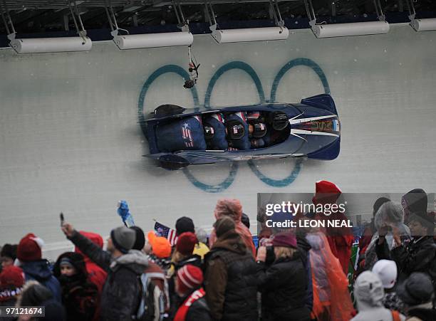 The USA-3 four-man bobsleigh team piloted by Mike Kohn during heat 1 at the Whistler sliding centre during the Vancouver Winter Olympics on February...