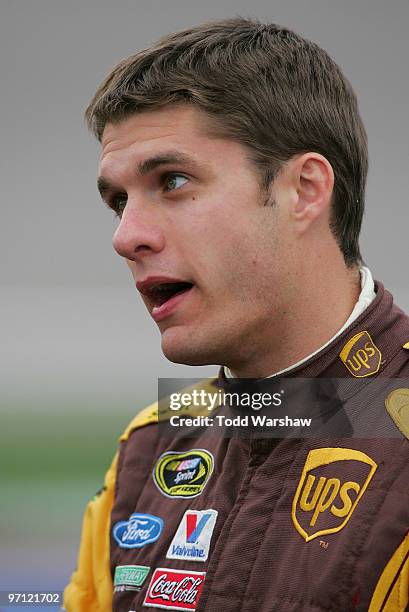 David Ragan, driver of the UPS Ford, stands on the grid during qualifying for the NASCAR Sprint Cup Series Shelby American at Las Vegas Motor...