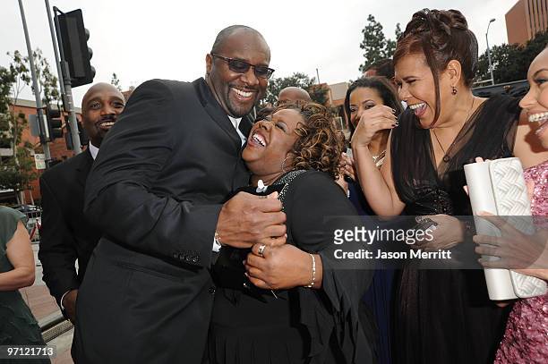Producer Roger M. Bobb and guest arrive at the 41st NAACP Image awards held at The Shrine Auditorium on February 26, 2010 in Los Angeles, California.