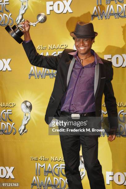 Singer Sila of Sila and the Afrofunk Experience, winner Outstanding World Music Album for "Black President," poses in the press room during the 41st...