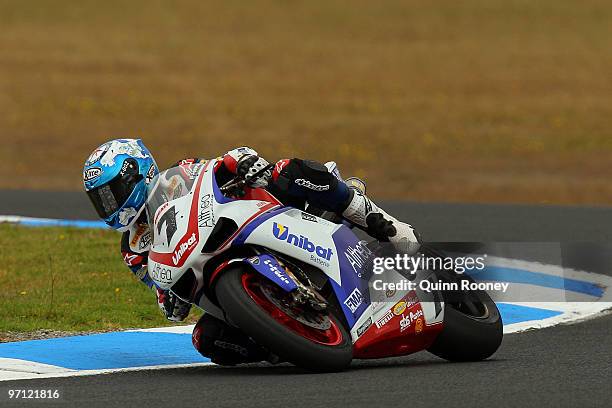Carlos Checa of Spain and the Althea Racing Team rounds the bend during qualifying practise for round one of the Superbike World Championship at...