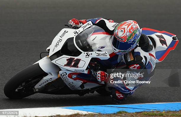 Troy Corser of Australia and the BMW Motorrad Motorsport Team prounds the bend during qualifying practise for round one of the Superbike World...