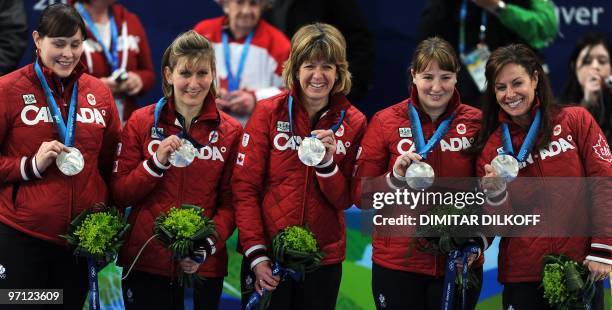 Canada's team celebrate with their silver medals after their women's curling gold medal match Canada vs Sweden games at the Vancouver Olympic Centre,...