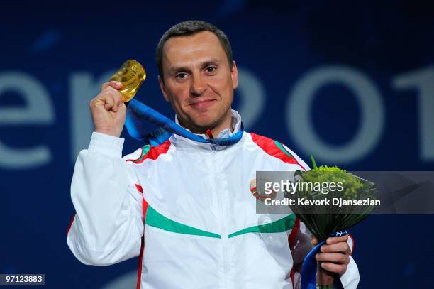 Alexei Grishin of Belarus celebrates winning the gold medal during the medal ceremony for the men�s freestyle skiing aerials on day 15 of the...