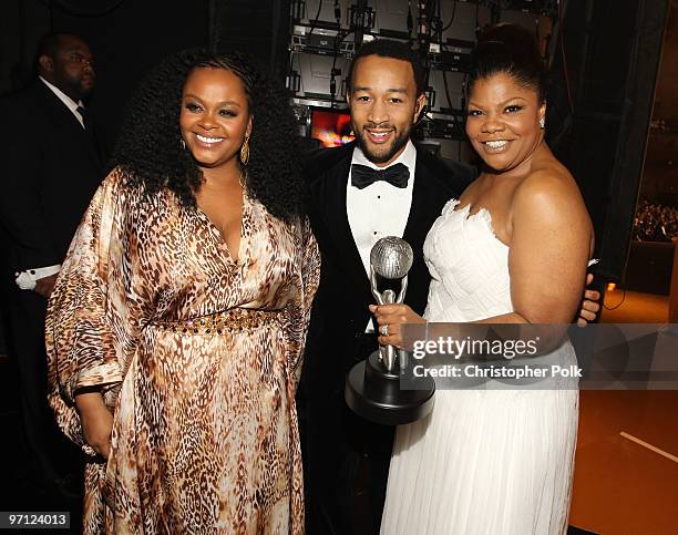 Singers Jill Scott and John Legend and actress Mo'Nique pose with her award for Outstanding Supporting Actress in a Motion Picture backstage during...