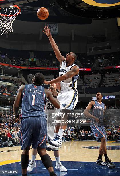 Darrell Arthur of the Memphis Grizzlies shotos over Stephen Jackson of the Charlotte Bobcats on February 26, 2010 at FedExForum in Memphis,...