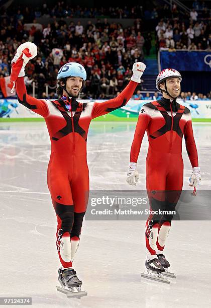 Gold medalist Charles Hamelin of Canada celebrates with bronze medalist Francois-Louis Tremblay of Canada in the Men's 500m Short Track Speed Skating...