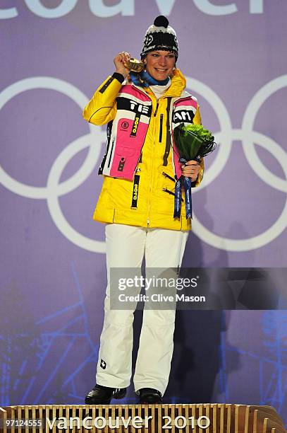 Maria Riesch of Germany celebrates winning the gold medal during the medal ceremony for the ladies alpine skiing slalom on day 15 of the Vancouver...