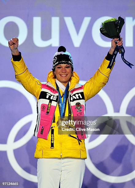 Maria Riesch of Germany celebrates winning the gold medal during the medal ceremony for the ladies alpine skiing slalom on day 15 of the Vancouver...